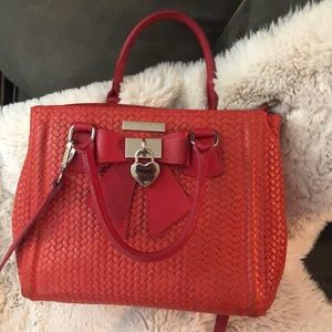 Red purse by Luisa Vannini*